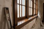 Window trim protection during Miami home renovation