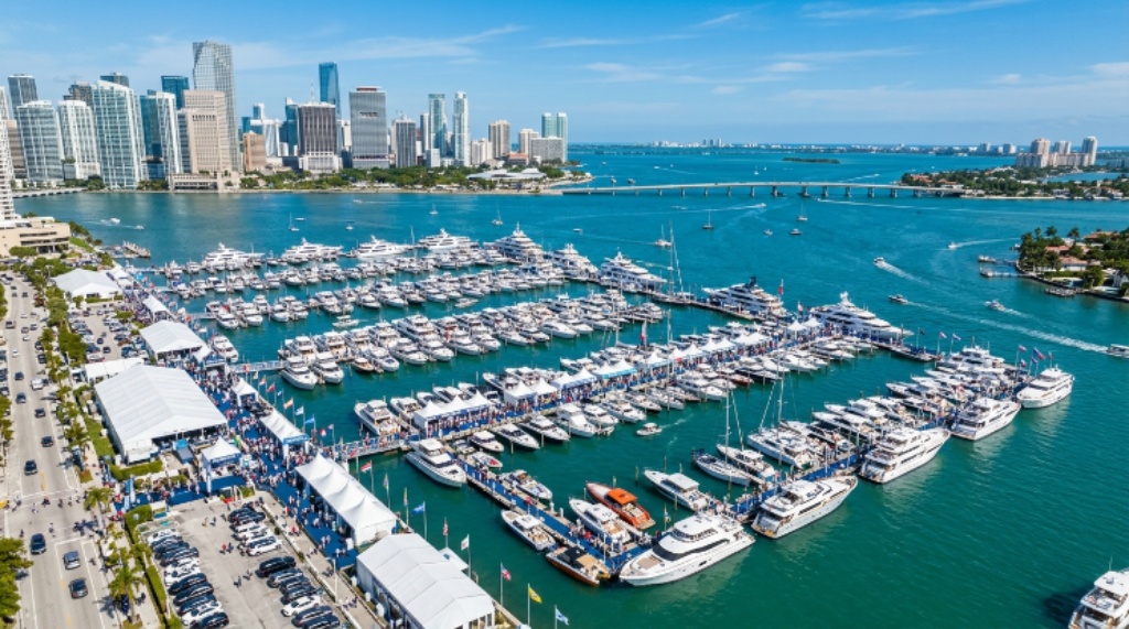 Aerial view of boats and yachts docked at the Miami International Boat Show during a sunny February afternoon